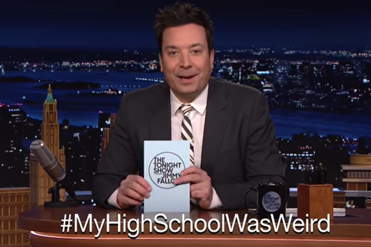 Jimmy Fallon on The Tonight Show smiling behind hashtag text