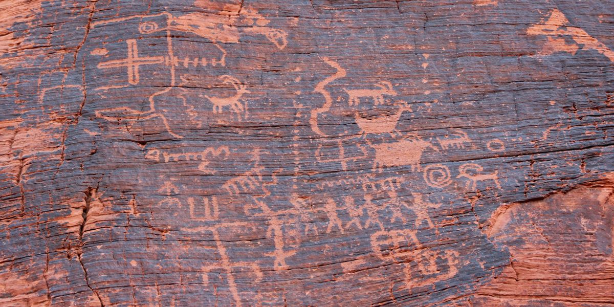 People Share The Prank Message They'd Leave On A Cave Wall If They Could Travel Back 100,000 Years