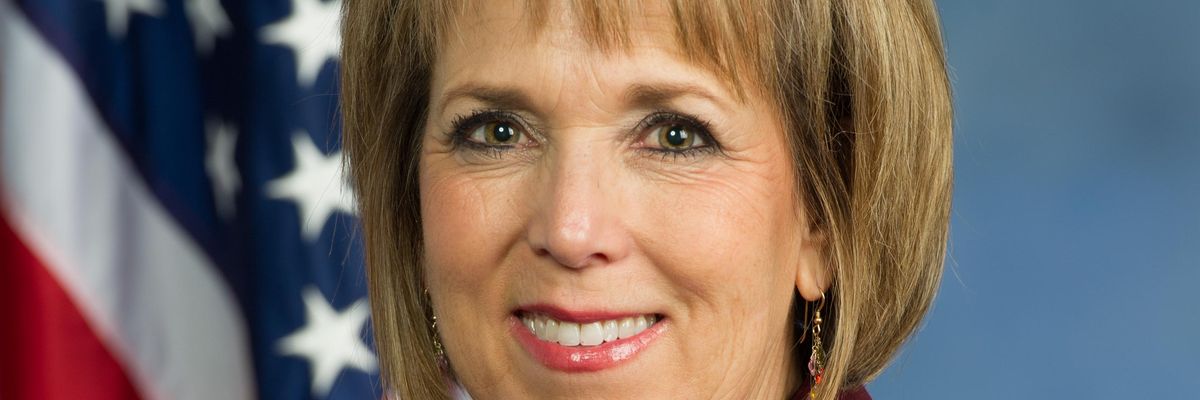 Lujan Grisham smiling.