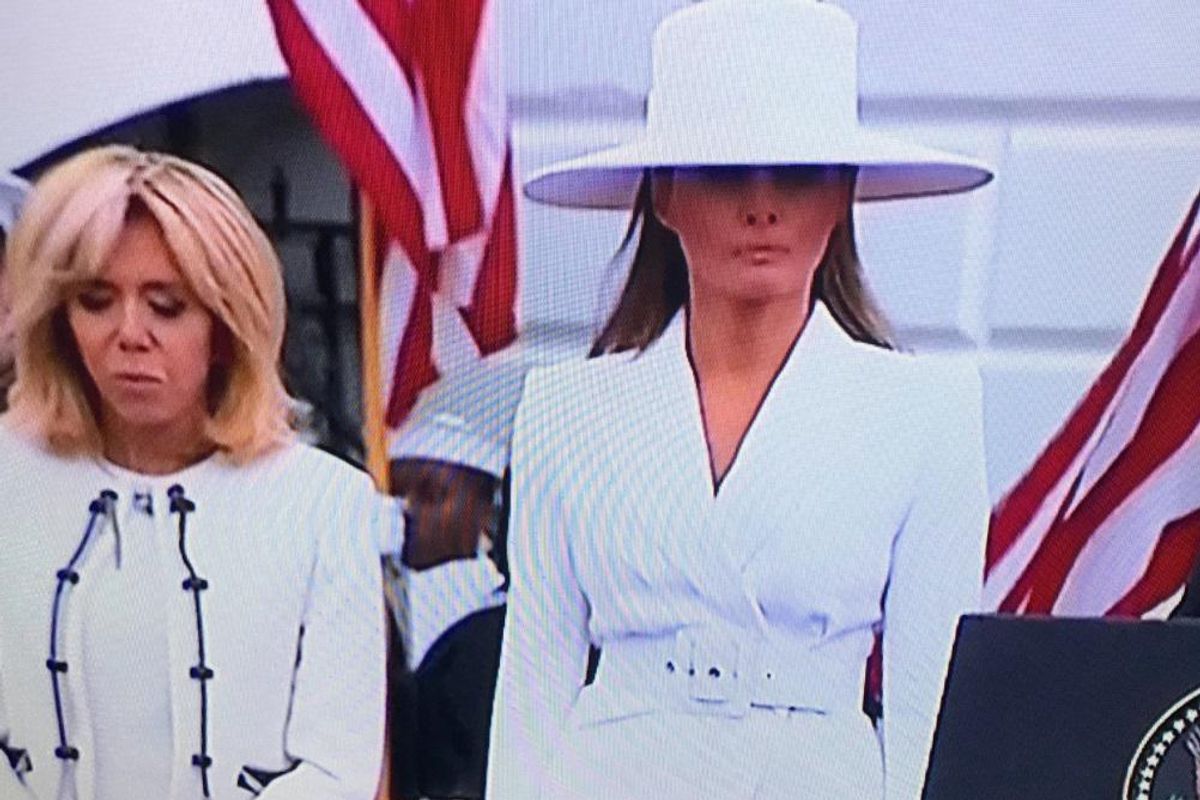 Melania in a white hat
