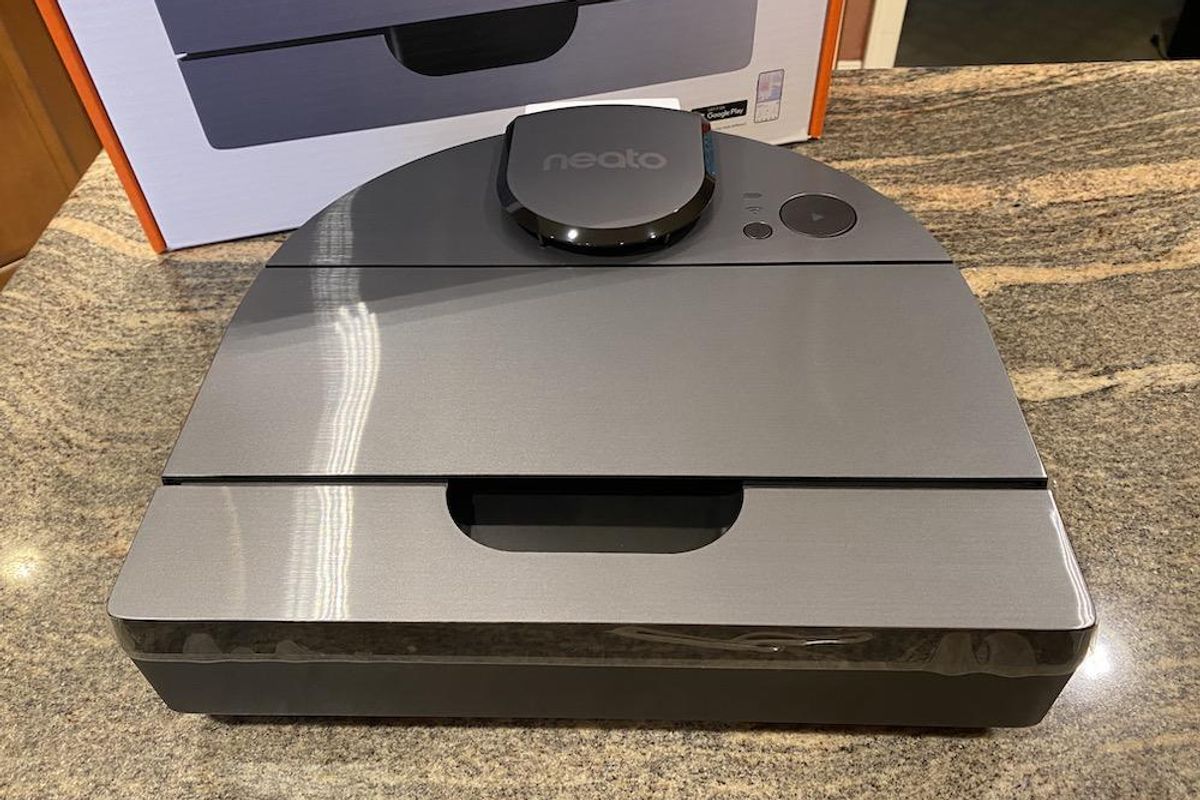 Neato D10 Smart Robot Vacuum Cleaner on a. countertop