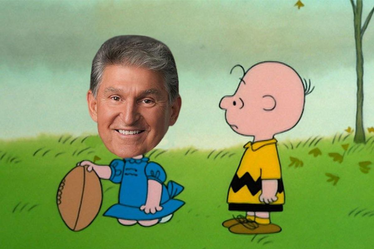 Hey Look! Joe Manchin's Holding A Football!
