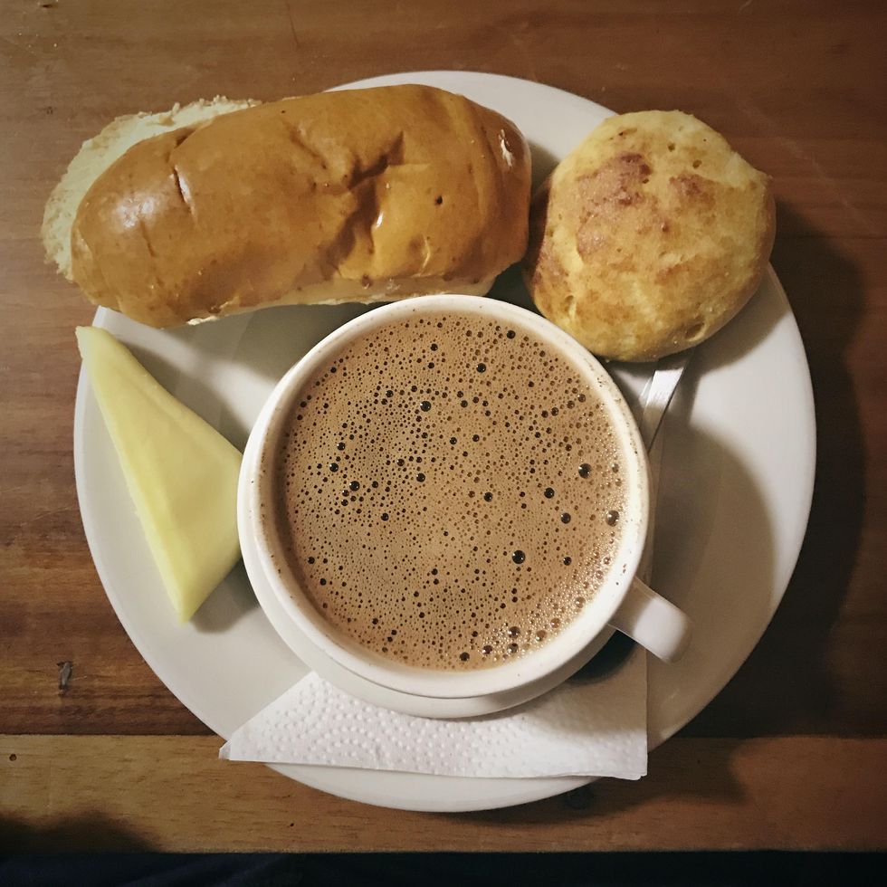Colombian hot chocolate served with cheese and bread