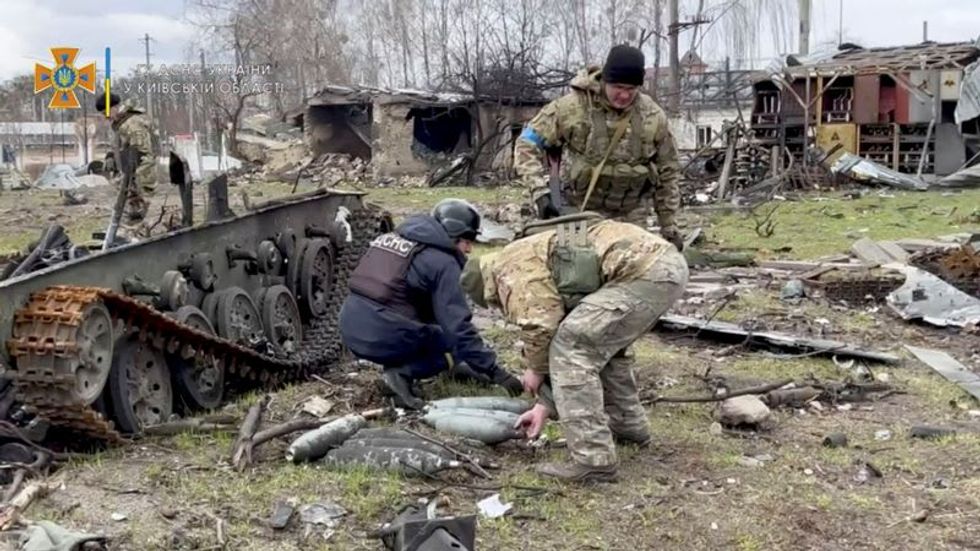 Russian Artillery Pounds Ukraine Cities As West Prepares New Sanctions