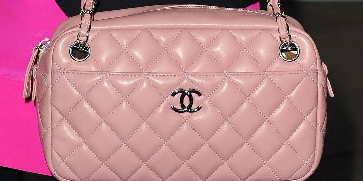 Russian Influencers Cut Up Chanel Bags to Protest Russophobic