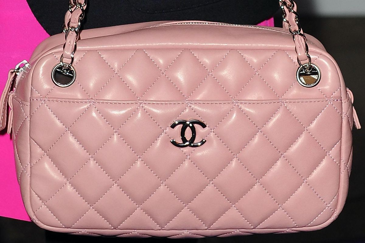 Russian Influencers Cut Up Chanel Bags to Protest 