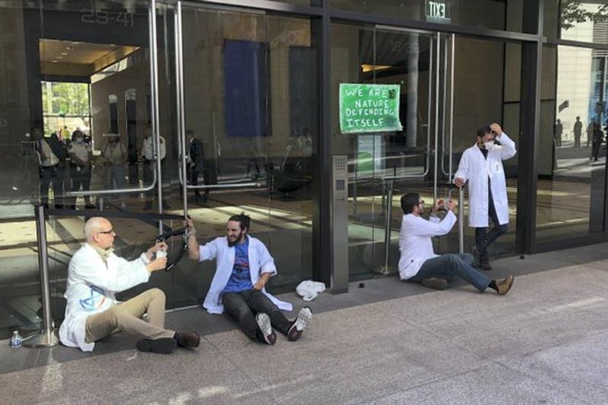 LAPD Needs Like A Million Cops To Arrest Four Scientists At Climate Protest