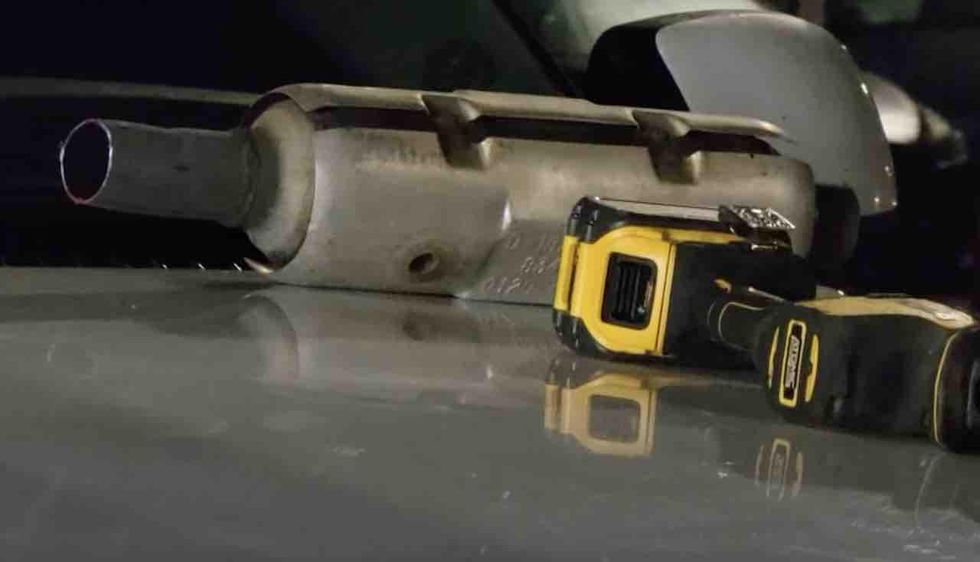 Suspect apparently tries to steal vehicle's catalytic converter; gets killed when same vehicle