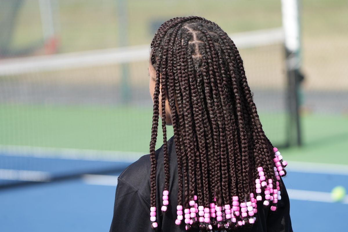 'Sweet' viral video of weightlifter's teammates taking out beads is why the CROWN Act is needed