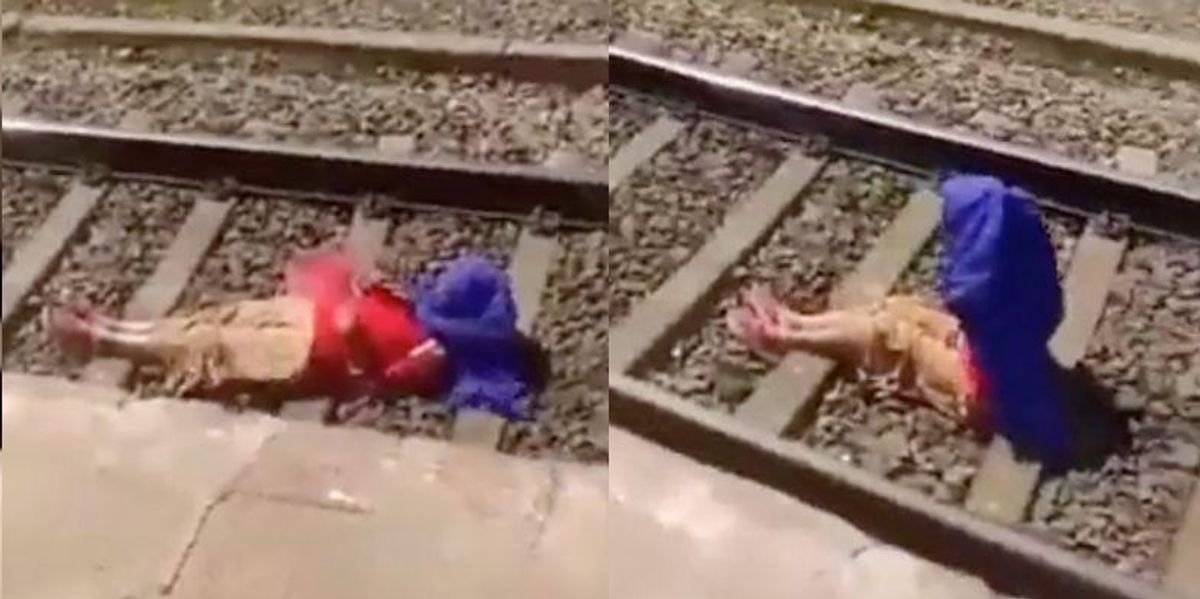 Video Of Woman Lying On Tracks And Talking On Phone As Train Passes Over Her Sparks Backlash