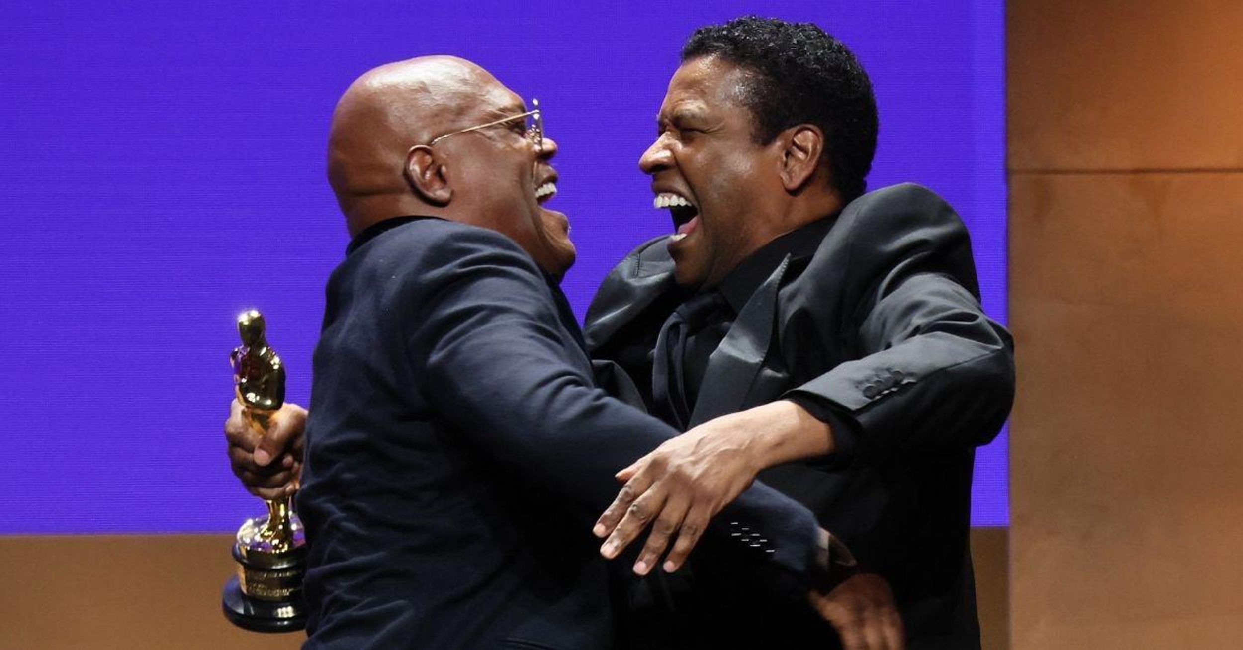 Denzel Washington Presented Honorary Oscar To Samuel L. Jackson Ahead Of Live Show—And Fans Are Pissed