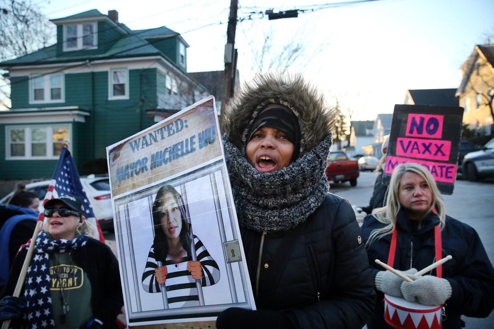 Boston will restrict demonstrations after anti-mandate protesters target the mayor and the mother of city councilman