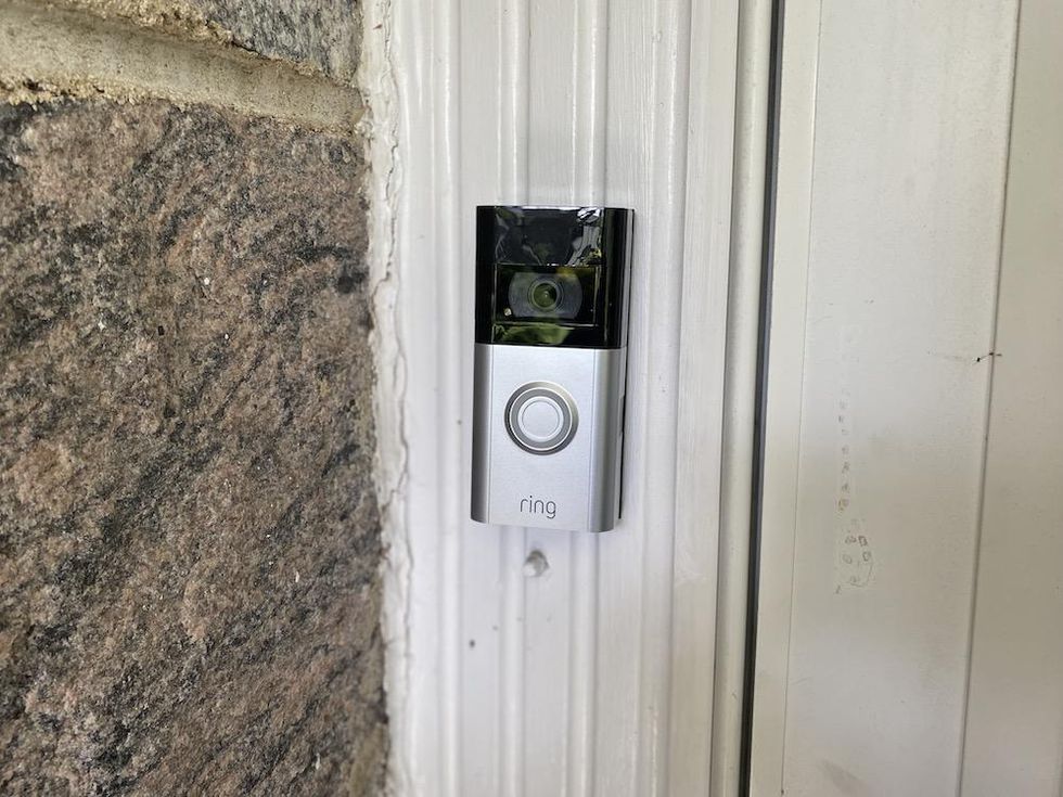 Photo of Ring Video Doorbell 4 installed on a home.