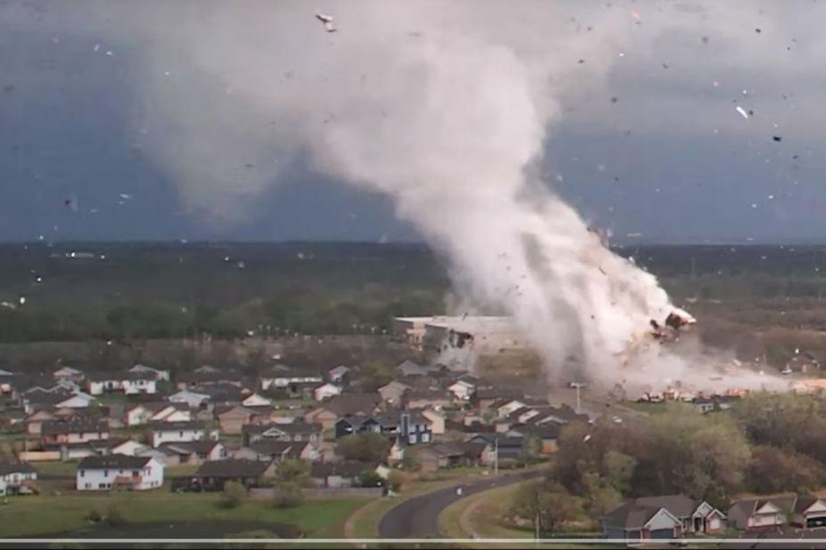 Storm chaser captured an eye-popping video of a tornado whipping through a Kansas town