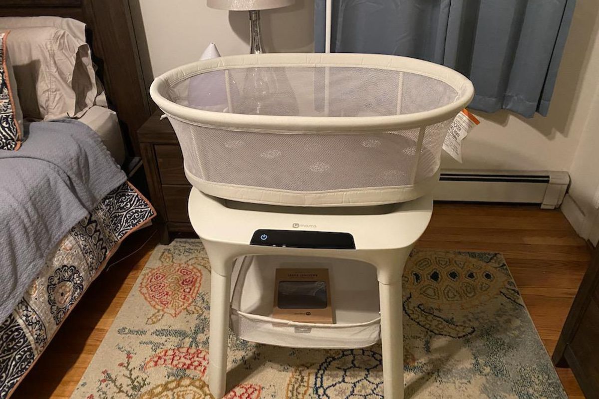 a photo of MamaRoo Sleep Bassinet in a bedroom