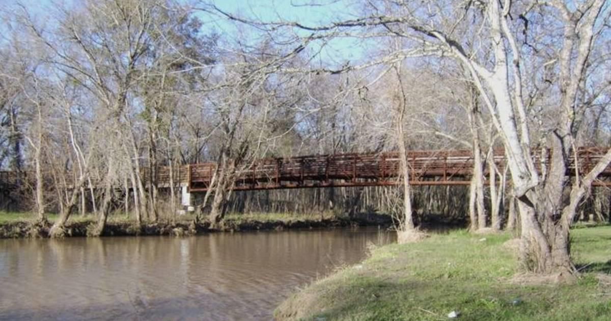 river beneath brown bridge