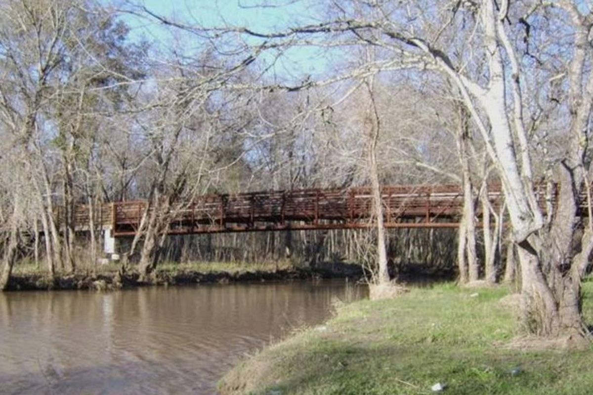 river beneath brown bridge
