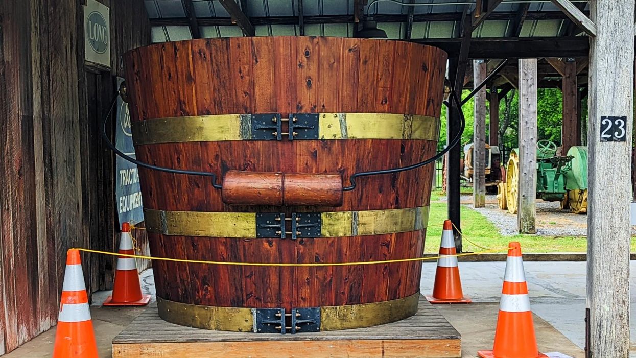 Two Southern towns claim to have the World's Largest Cedar Bucket. Here's the backstory