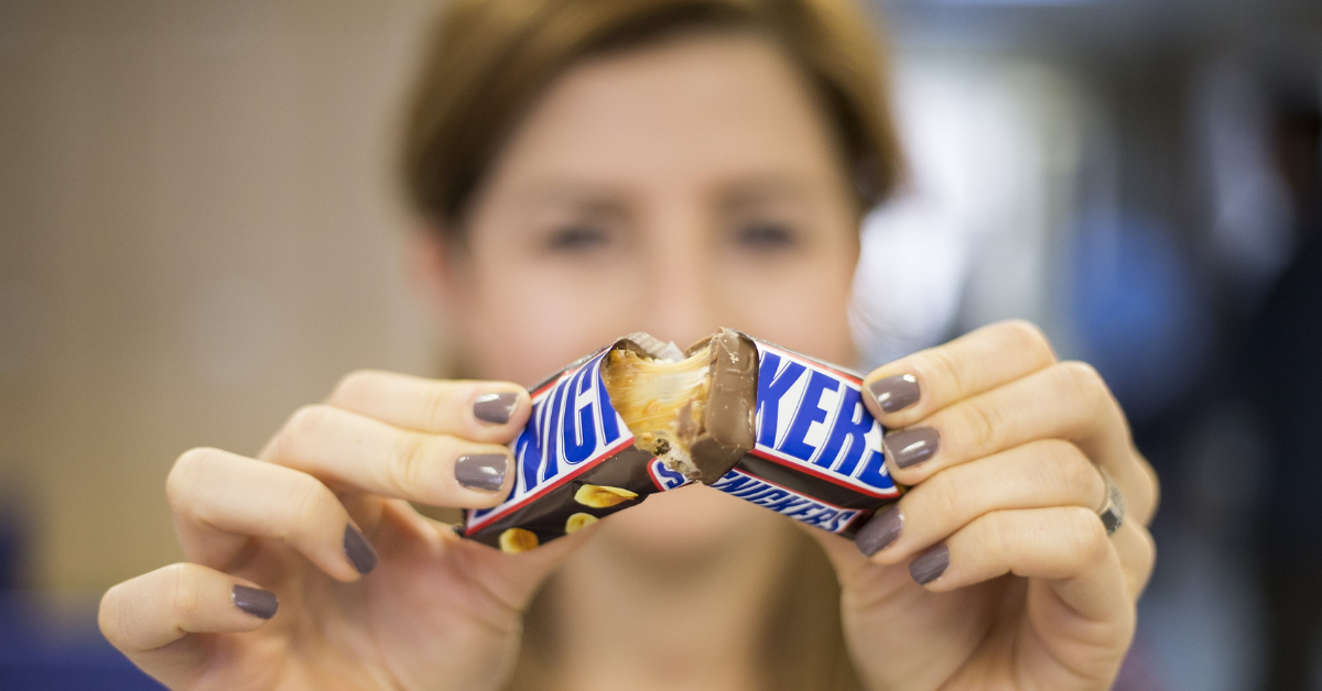 Snickers Hilariously Shuts Down NSFW Rumor They Removed The 'D*ck Vein' From Their Candy Bar