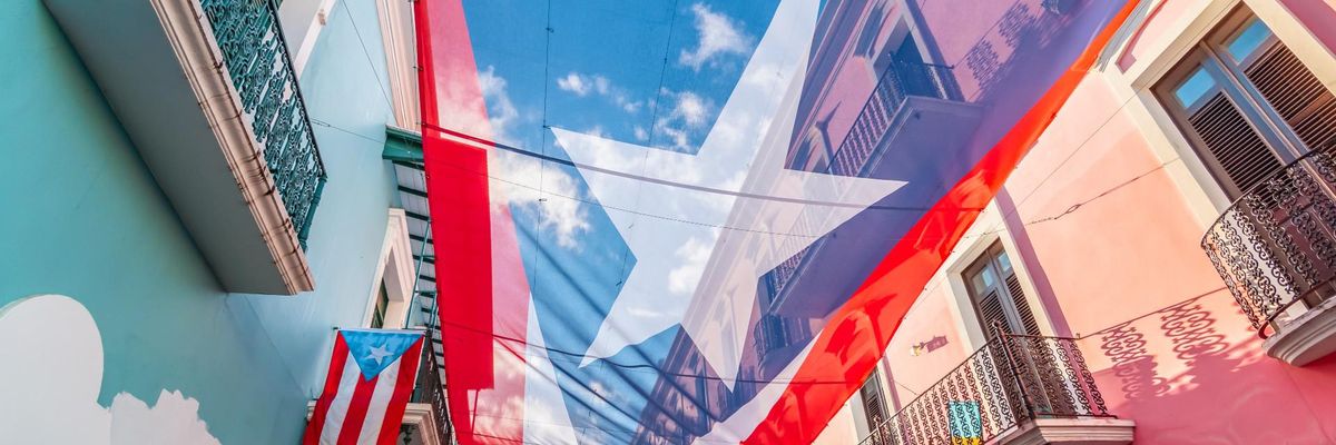 Puerto Rican Flag hanging from windows