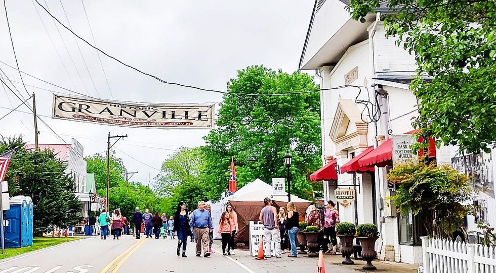 Downtown Granville during festival season, with lots of people walking