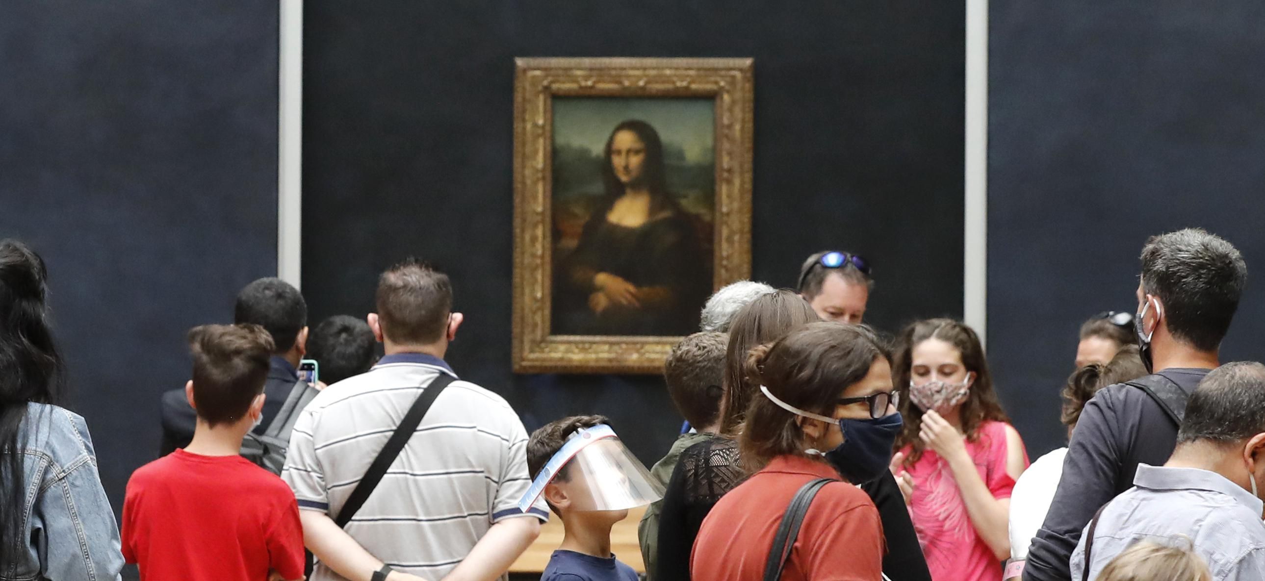 Video: Mona Lisa smeared with cake by climate change activist | Newshub