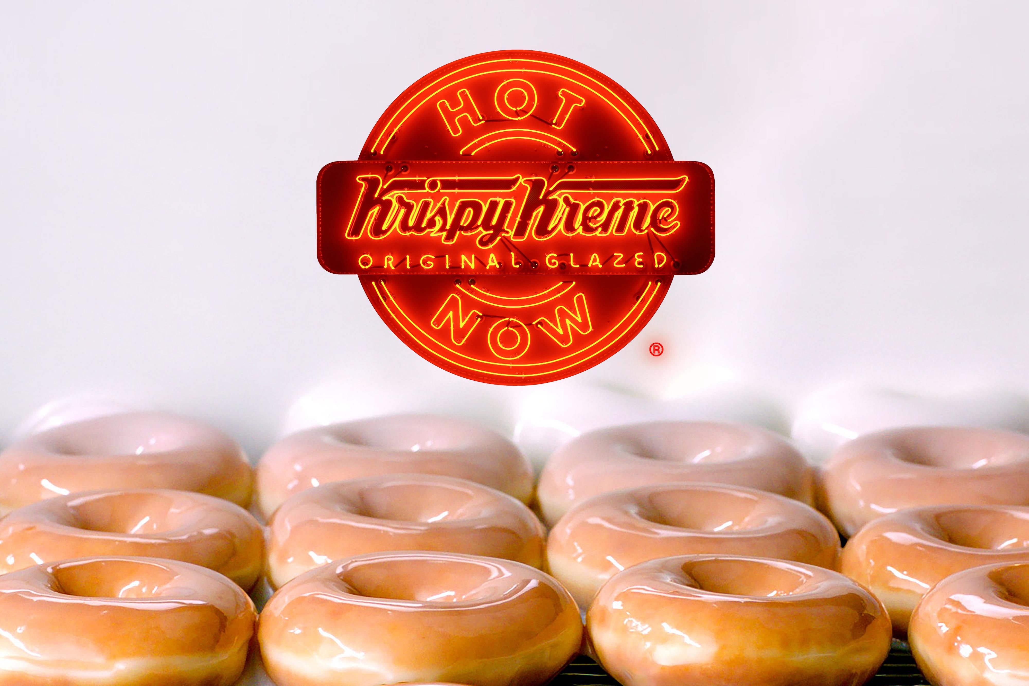 Krispy Kreme is giving away free doughnuts any time the hot light is on