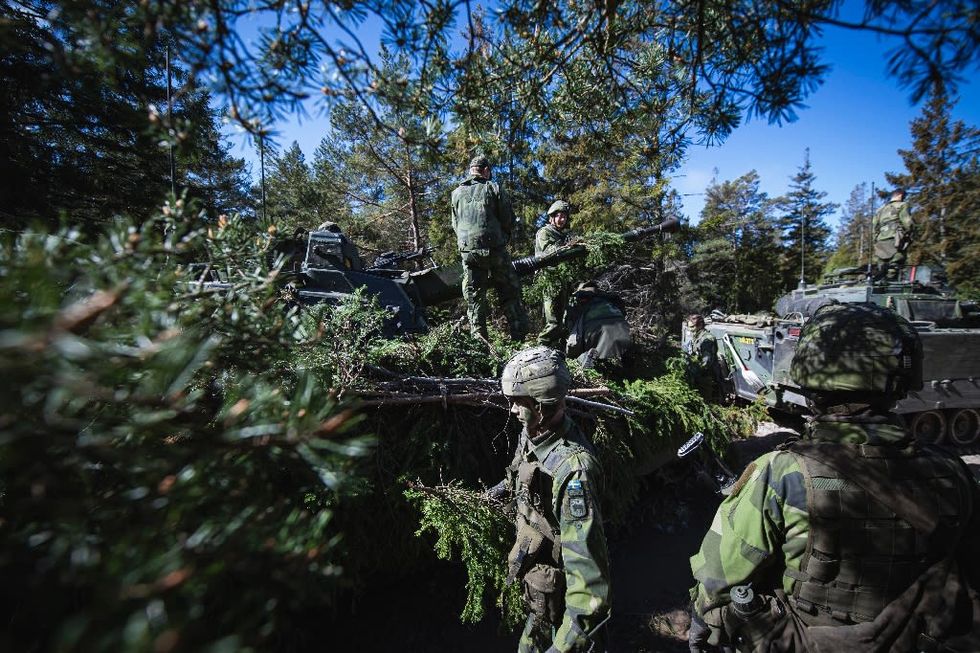 Finland, Sweden Ask To Join NATO As Ukraine War Crimes Trial Begins