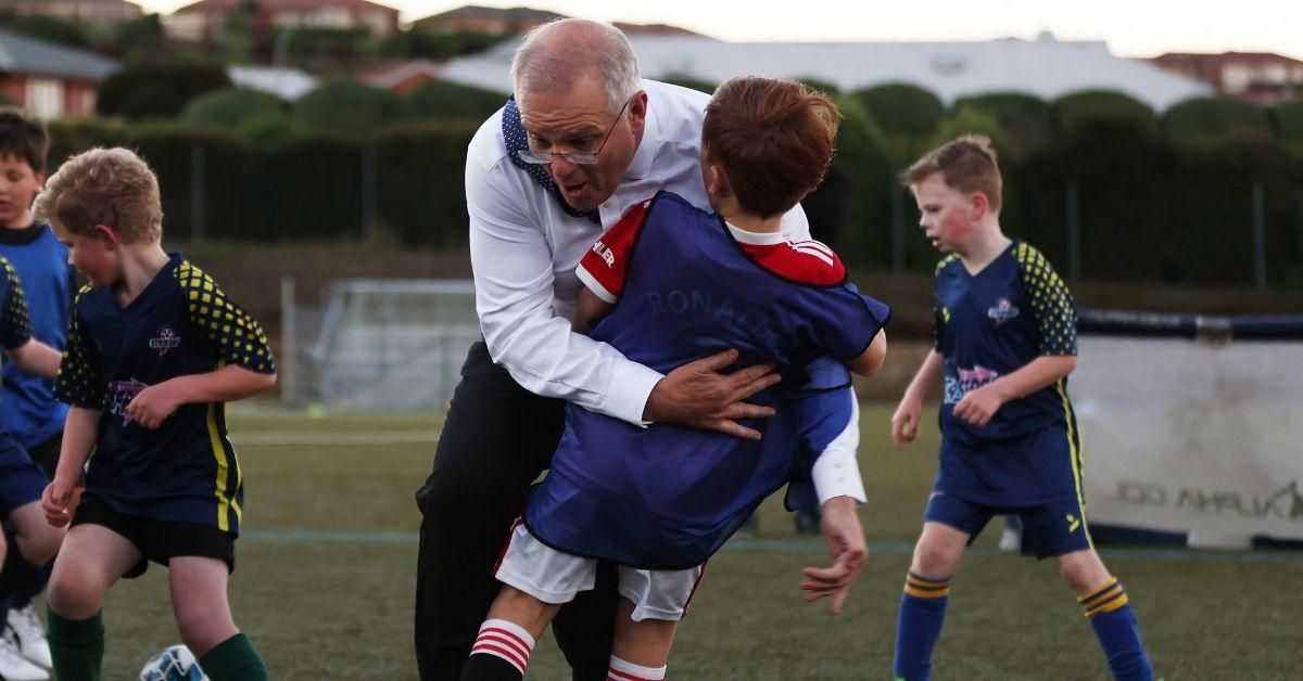 Australian Prime Minister Accidentally Tackles Young Boy While Playing Soccer—And Twitter Is LOLing