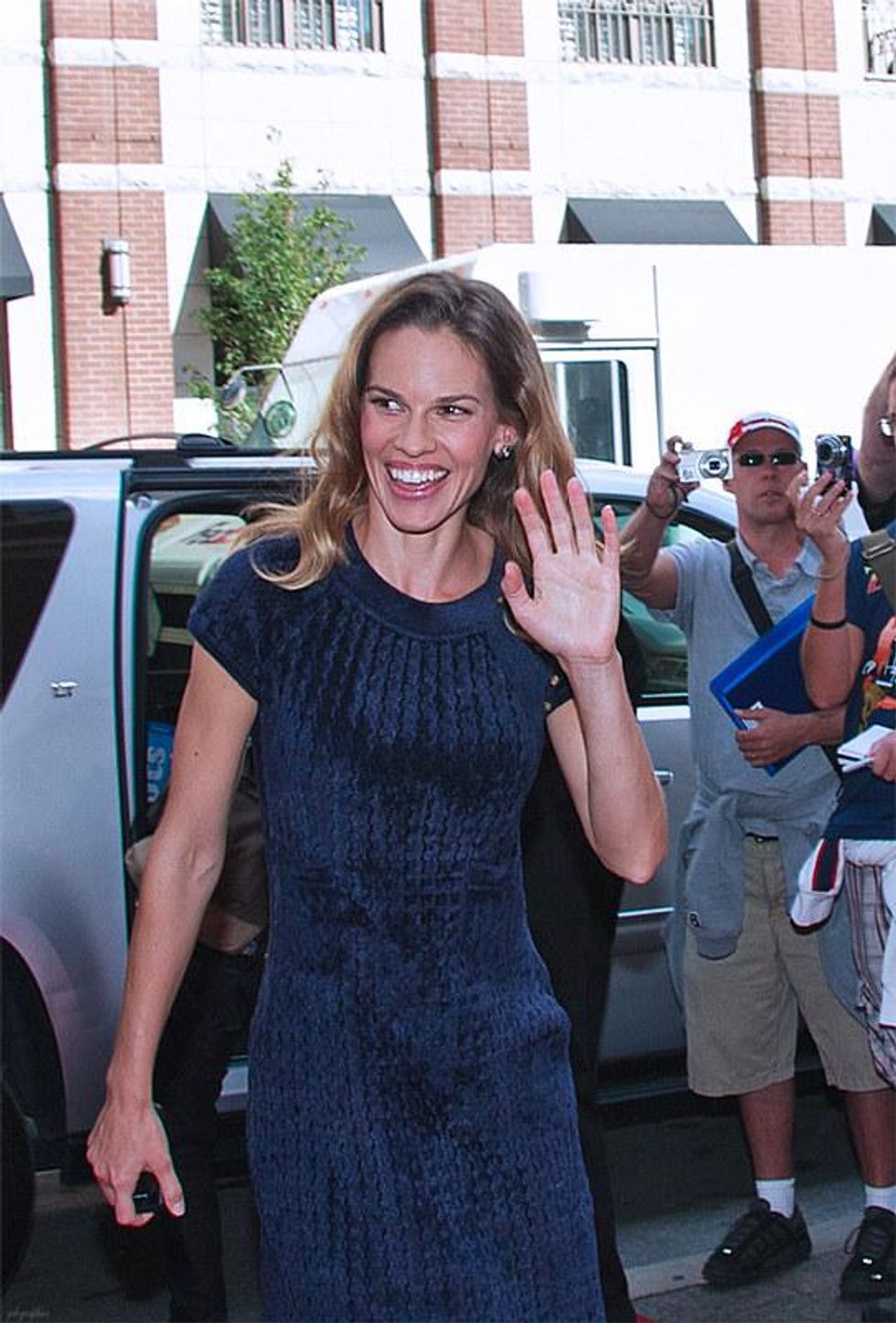 Woman relieved to find her lost dog was rescued by none other than Hilary Swank