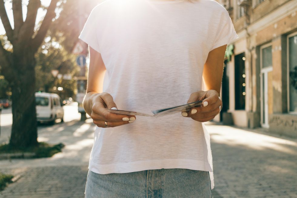 Woman walking in white shirt