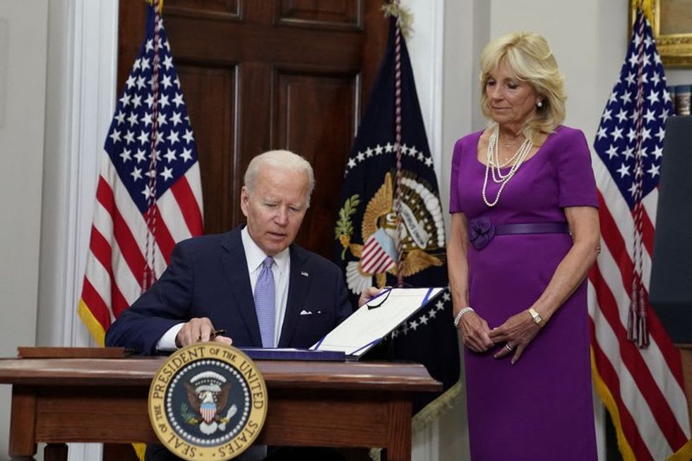 Biden Signs Bipartisan Gun Safety Bill Into Law