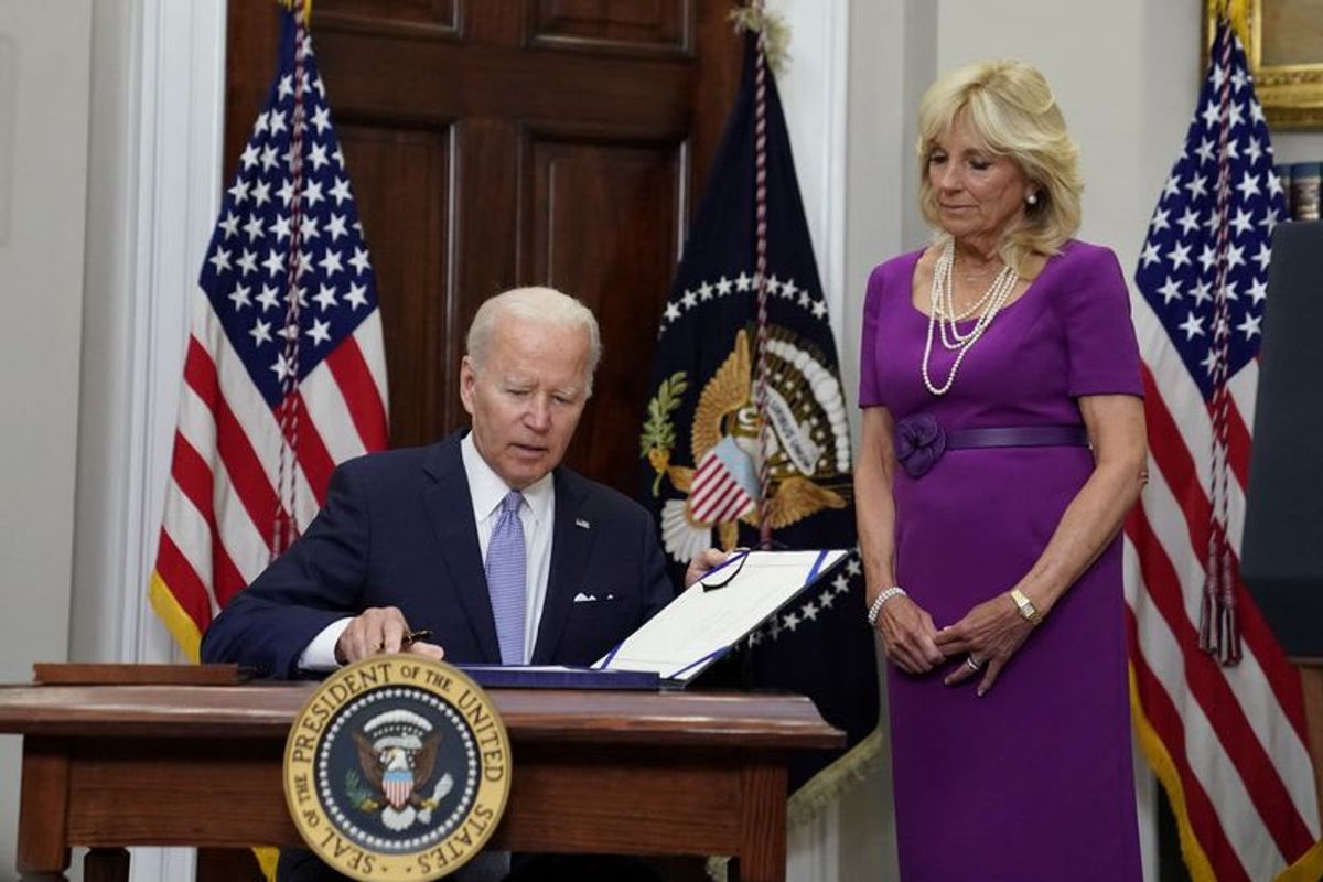 President Biden Signs Spending Bill To Avert Shutdown, Urges Ukraine Aid