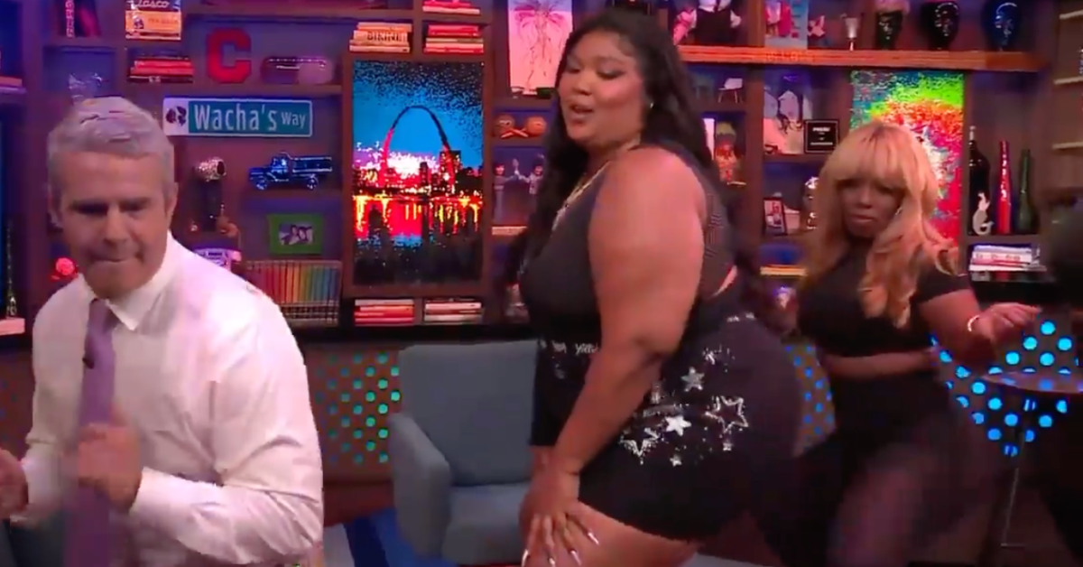 Lizzo Tried To Teach Andy Cohen How To Twerk His 'Tiny Hiney'—And He Gets An 'E' For Effort