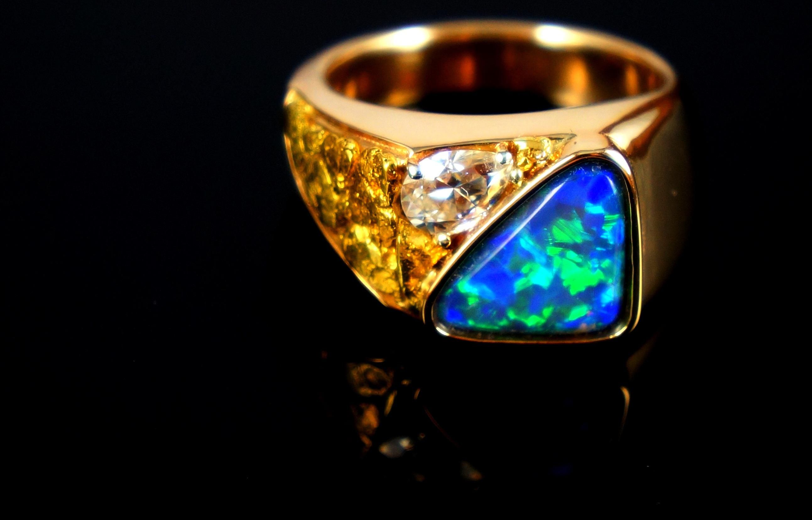 Top 3 Unique Black Opal Engagement Rings by The Wind