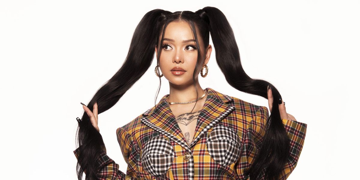 Bella Poarch Battles Grimes in 'Dolls' Video