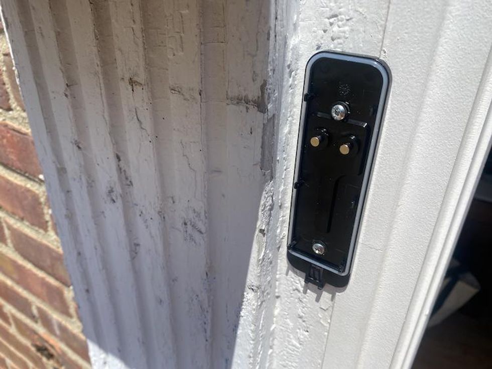 a photo of Blink back plate installed on a house