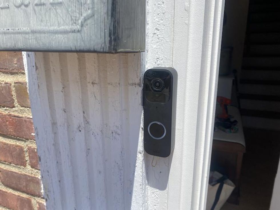 a photo of Blink Video Doorbell on a house.