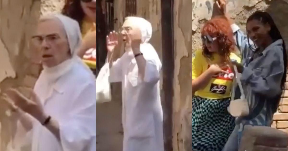 Outraged Nun Goes Viral After Interrupting Photoshoot Of Two Female Models Kissing On Street