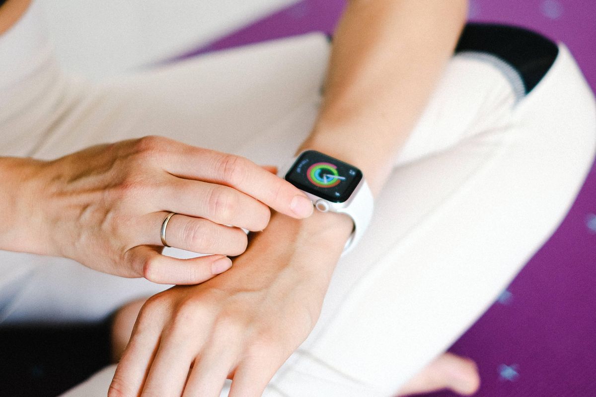 woman wearing Apple Watch