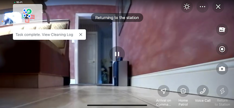 video feed from Ecovacs app of vacuum on home patrol