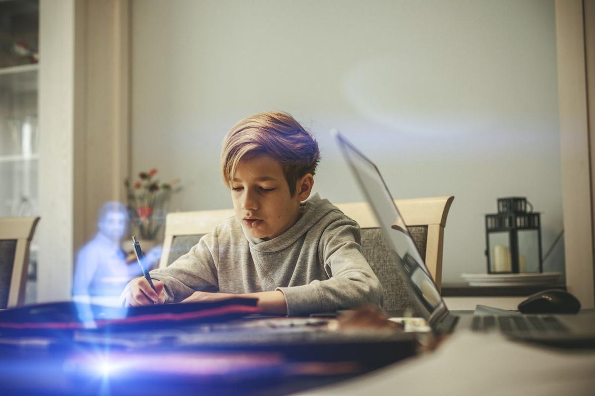 a student using a hologram to study