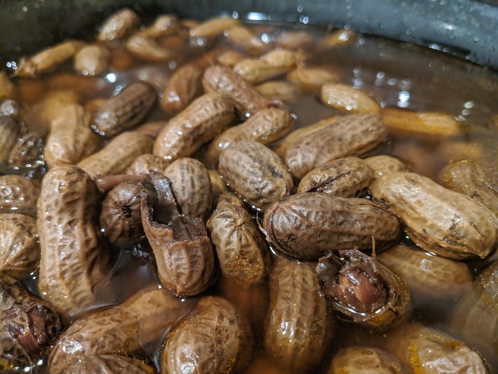 Boiled peanuts in water.