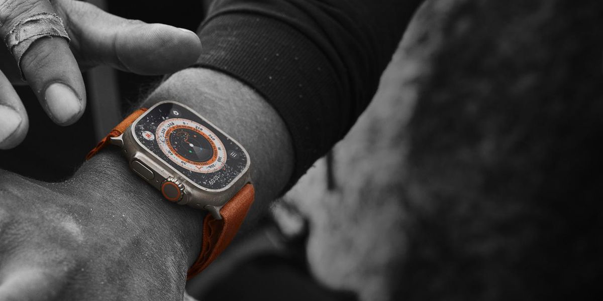 a photo of Apple Watch Ultra on a man's wrist.