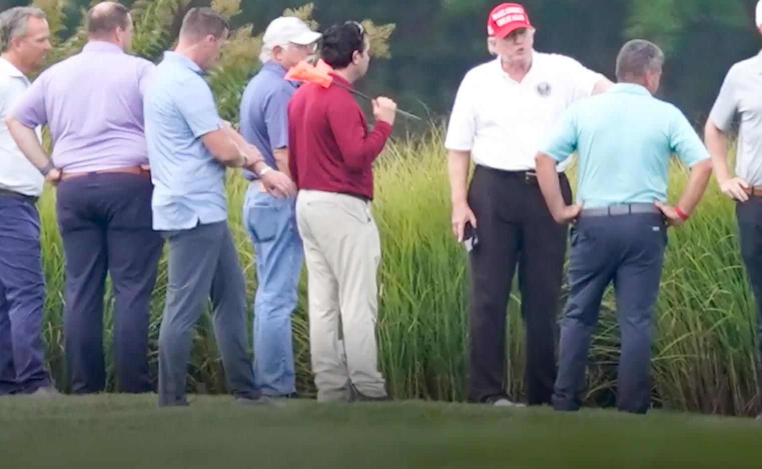 After Flight To Washington, Trump Seen With Large Group On Golf Course