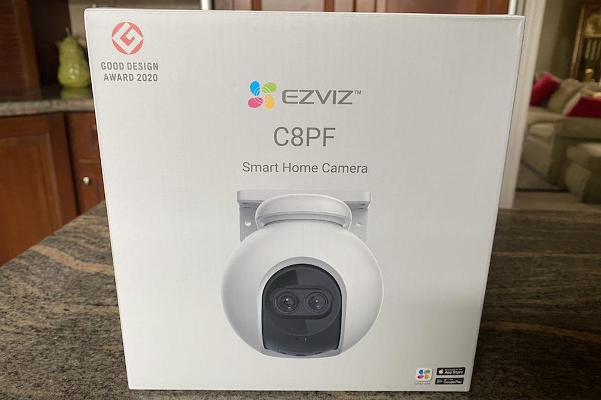 a photo of Ezviz C8PF Smart Home Camera on a countertop