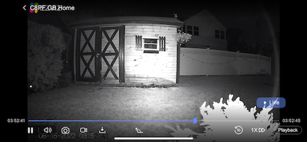 a photo taken from a live feed of Ezviz C8PF Smart Home Camera at nightime