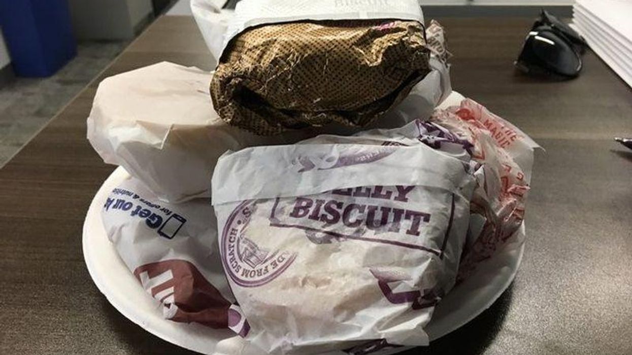 Lots of fast-food biscuits in a bowl.