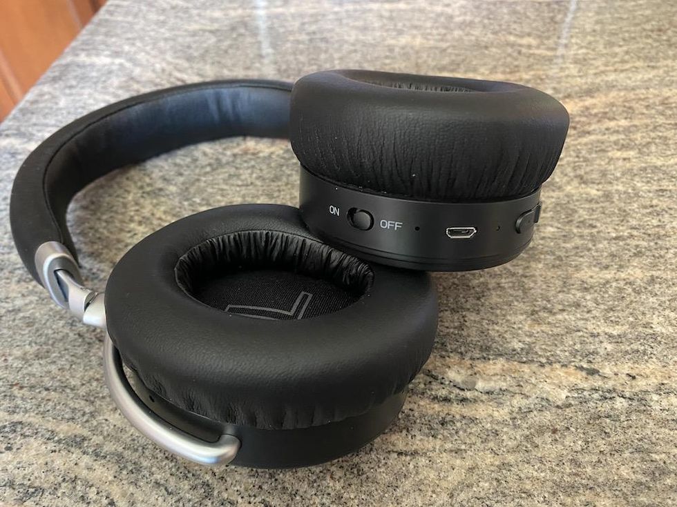 A photo of Monoprice SYNC-ANC Headphones showing micro-USB port