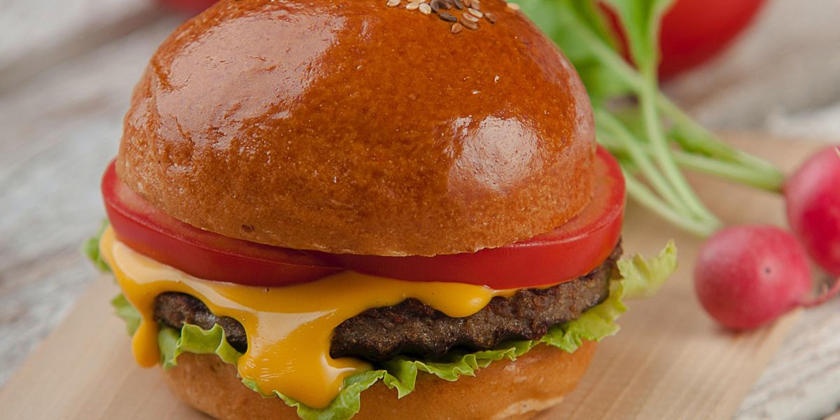 hamburger with tomato, lettuce and cheese